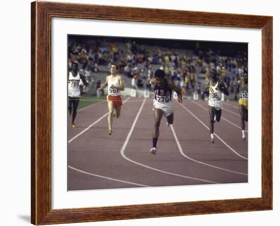 US Athlete Lee Evans Going Through Finish Line During Race at Summer Olympics-null-Framed Premium Photographic Print