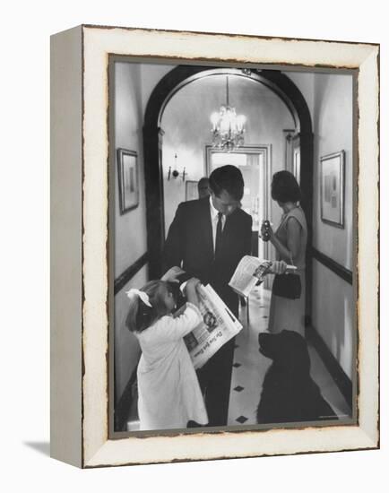 US Attorney General Bobby Kennedy Browsing Copy of the NY Times with daughter and Wife-George Silk-Framed Premier Image Canvas