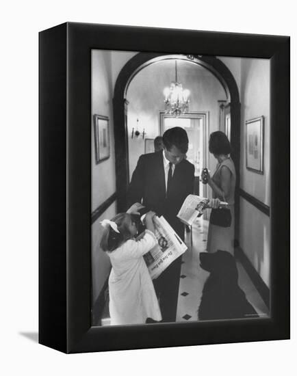 US Attorney General Bobby Kennedy Browsing Copy of the NY Times with daughter and Wife-George Silk-Framed Premier Image Canvas