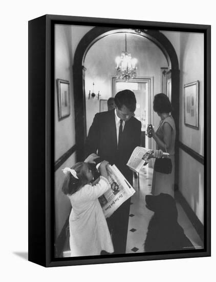 US Attorney General Bobby Kennedy Browsing Copy of the NY Times with daughter and Wife-George Silk-Framed Premier Image Canvas