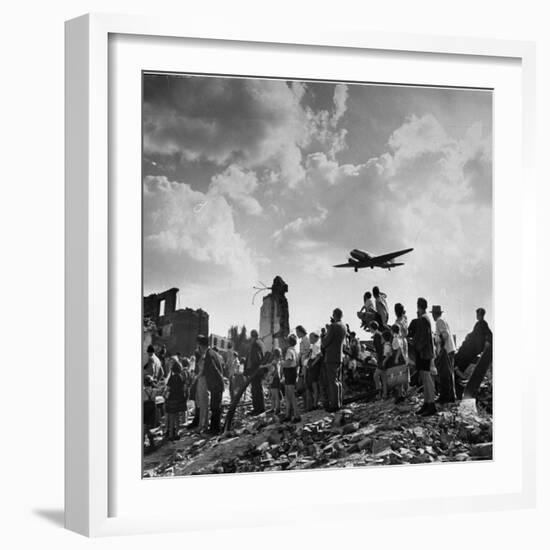 US C-47 Cargo Plane Flying over Ruins, Approaching Tempelhof Airport with Food and Supplies-Walter Sanders-Framed Photographic Print