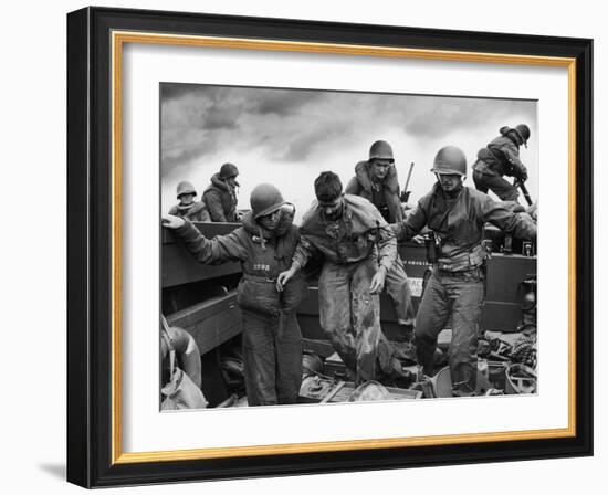 US Coast Guardsmen Assisting a Wounded Marine Returning from the Fight on Iwo Jima-null-Framed Photographic Print