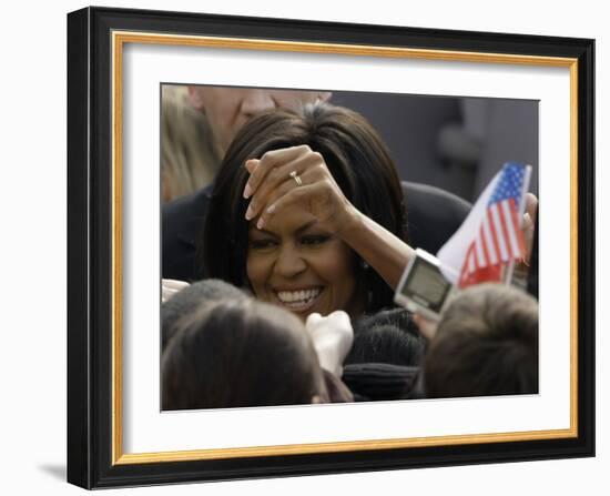 US First Lady Michelle Obama Greets the Crowd after Her Husband's Speech in Prague, Czech Republic-null-Framed Photographic Print