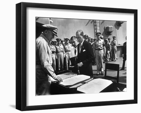 US General Sutherland Checks Official Surrender Documents, USS Missouri-Carl Mydans-Framed Photographic Print