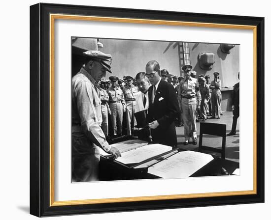 US General Sutherland Checks Official Surrender Documents, USS Missouri-Carl Mydans-Framed Photographic Print