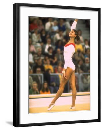 Us Gymnast Ludmila Turishcheva Performing A Floor Exercise At