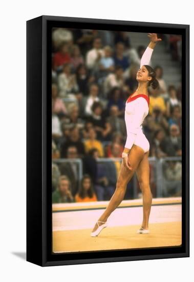 US Gymnast Ludmila Turishcheva Performing a Floor Exercise at the Summer Olympics-John Dominis-Framed Premier Image Canvas