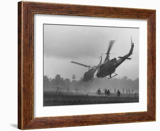 US Helicopters Carrying South Vietnamese Troops in Raid on Viet Cong Positions-Larry Burrows-Framed Photographic Print