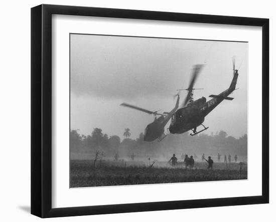 US Helicopters Carrying South Vietnamese Troops in Raid on Viet Cong Positions-Larry Burrows-Framed Photographic Print