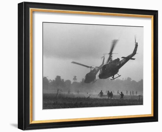 US Helicopters Carrying South Vietnamese Troops in Raid on Viet Cong Positions-Larry Burrows-Framed Photographic Print