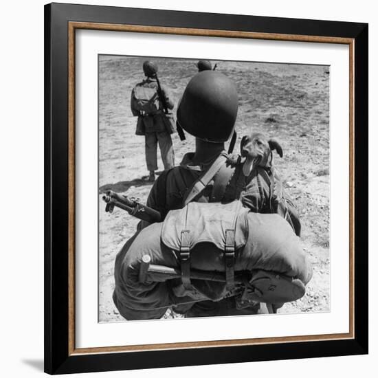 US Marine Jesse Goin Carrying His Dog Towards the Front During the Fighting on Kwajalein-George Strock-Framed Photographic Print