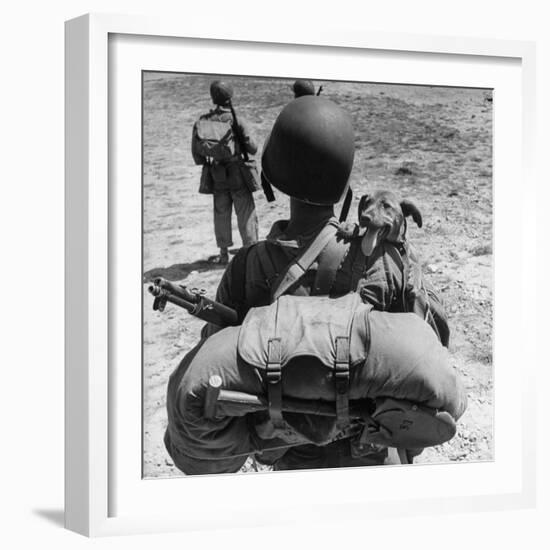 US Marine Jesse Goin Carrying His Dog Towards the Front During the Fighting on Kwajalein-George Strock-Framed Photographic Print