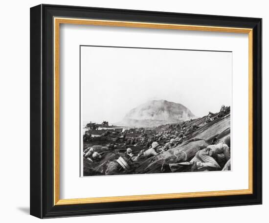 US Marines Advance Up Black Sand Beaches of Iwo Jima to Engage Japanese Troops-Louis R. Lowery-Framed Photographic Print