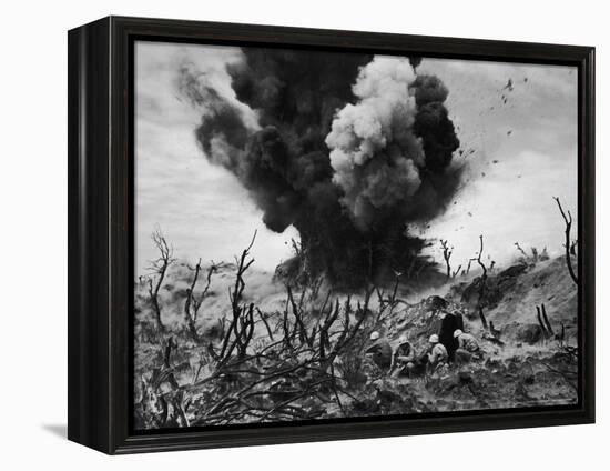 US Marines Crouching Behind Hillside Rock Cover, Blowing Up Cave Connected to Japanese Blockhouse-W^ Eugene Smith-Framed Premier Image Canvas