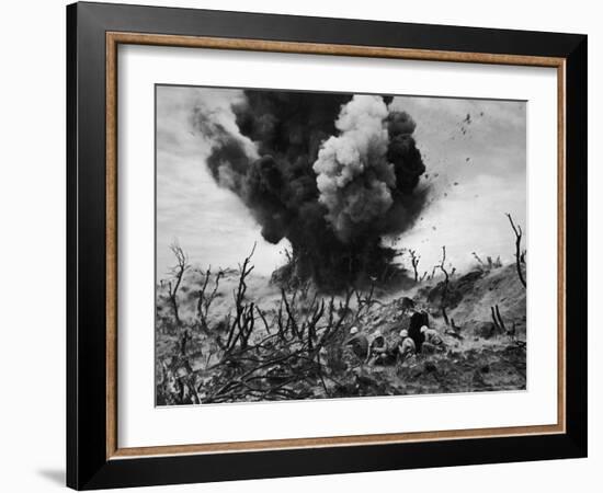 US Marines Crouching Behind Hillside Rock Cover, Blowing Up Cave Connected to Japanese Blockhouse-W^ Eugene Smith-Framed Photographic Print