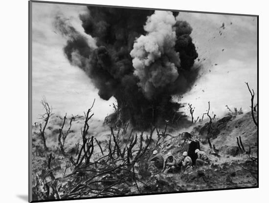 US Marines Crouching Behind Hillside Rock Cover, Blowing Up Cave Connected to Japanese Blockhouse-W^ Eugene Smith-Mounted Photographic Print