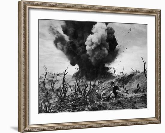 US Marines Crouching Behind Hillside Rock Cover, Blowing Up Cave Connected to Japanese Blockhouse-W^ Eugene Smith-Framed Photographic Print