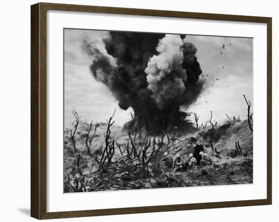 US Marines Crouching Behind Hillside Rock Cover, Blowing Up Cave Connected to Japanese Blockhouse-W^ Eugene Smith-Framed Photographic Print