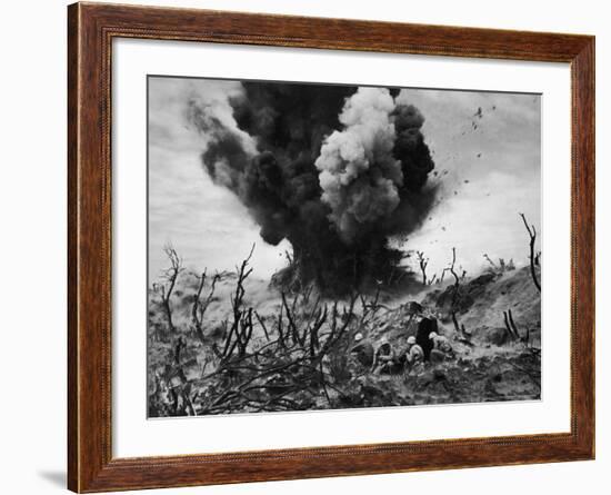 US Marines Crouching Behind Hillside Rock Cover, Blowing Up Cave Connected to Japanese Blockhouse-W^ Eugene Smith-Framed Photographic Print