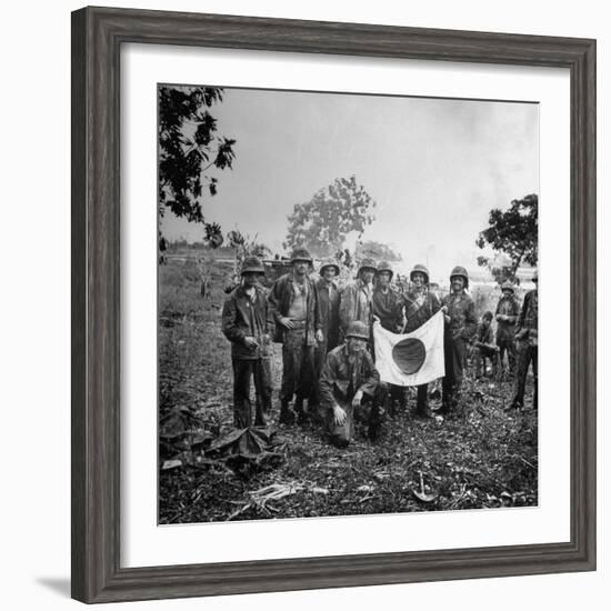 US Marines Holding Japanese Flag Captured During First Days of the Saipan Offensive-Peter Stackpole-Framed Photographic Print