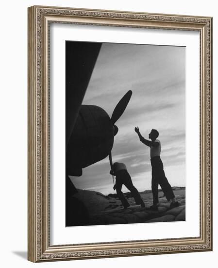 US Marines Pushing Through the Props of Bomber at US Naval Base on Midway Island-Frank Scherschel-Framed Photographic Print