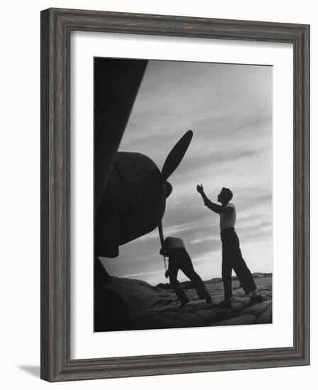 US Marines Pushing Through the Props of Bomber at US Naval Base on Midway Island-Frank Scherschel-Framed Photographic Print