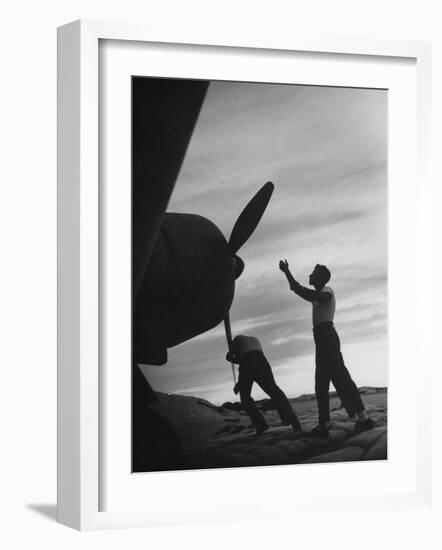 US Marines Pushing Through the Props of Bomber at US Naval Base on Midway Island-Frank Scherschel-Framed Photographic Print