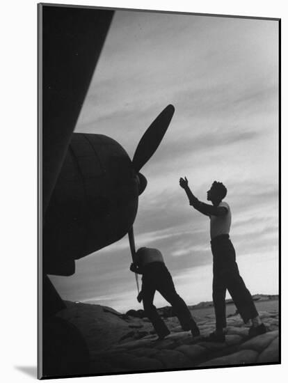 US Marines Pushing Through the Props of Bomber at US Naval Base on Midway Island-Frank Scherschel-Mounted Photographic Print