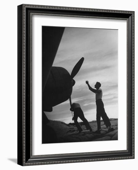 US Marines Pushing Through the Props of Bomber at US Naval Base on Midway Island-Frank Scherschel-Framed Photographic Print