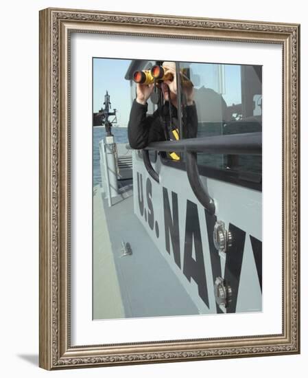 Us Navy Mate Looks Through Binoculars as He Patrols the Coastal Waters of the Persian Gulf-Stocktrek Images-Framed Photographic Print