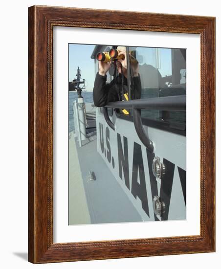 Us Navy Mate Looks Through Binoculars as He Patrols the Coastal Waters of the Persian Gulf-Stocktrek Images-Framed Photographic Print