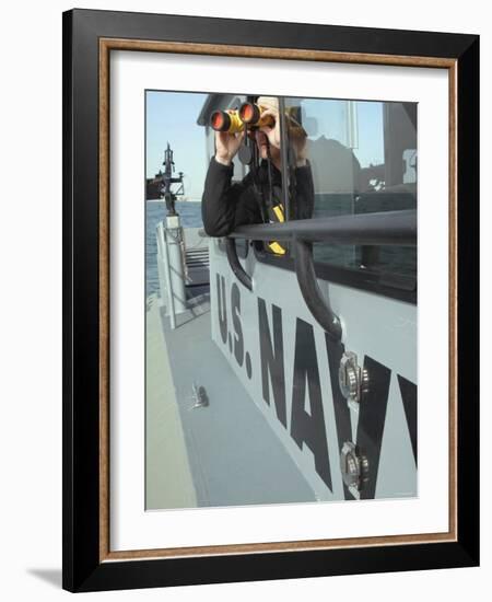 Us Navy Mate Looks Through Binoculars as He Patrols the Coastal Waters of the Persian Gulf-Stocktrek Images-Framed Photographic Print