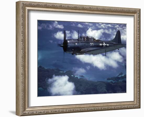 US Navy SBD Dauntless in Flight During Palau Islands Air Raid Attack-J^ R^ Eyerman-Framed Photographic Print