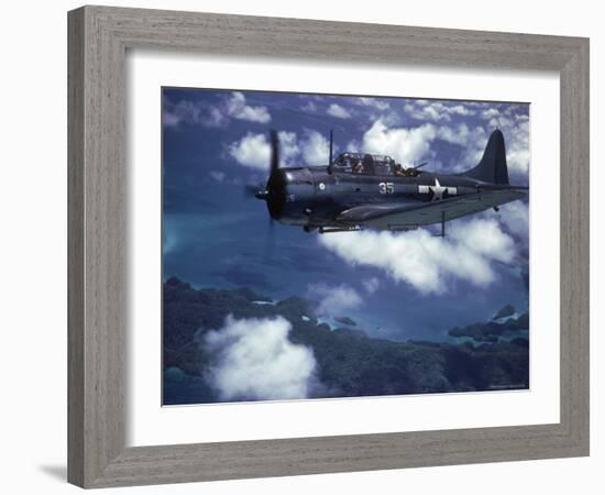 US Navy SBD Dauntless in Flight During Palau Islands Air Raid Attack-J^ R^ Eyerman-Framed Photographic Print