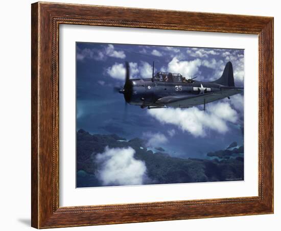 US Navy SBD Dauntless in Flight During Palau Islands Air Raid Attack-J^ R^ Eyerman-Framed Photographic Print