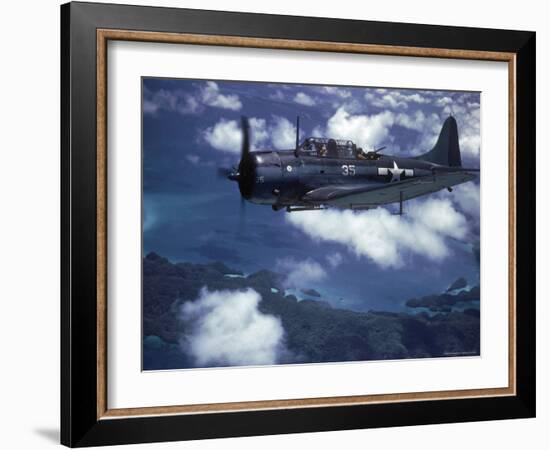 US Navy SBD Dauntless in Flight During Palau Islands Air Raid Attack-J^ R^ Eyerman-Framed Photographic Print