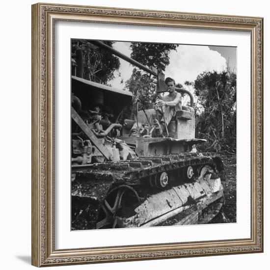 US Navy Seabee Robert H. Sellers of Eugene, or Operating a Caterpiller-J^ R^ Eyerman-Framed Photographic Print