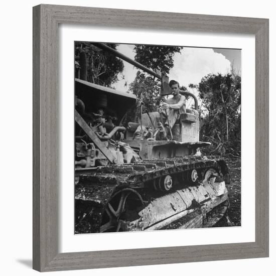 US Navy Seabee Robert H. Sellers of Eugene, or Operating a Caterpiller-J^ R^ Eyerman-Framed Photographic Print