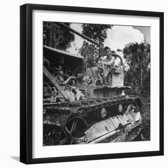 US Navy Seabee Robert H. Sellers of Eugene, or Operating a Caterpiller-J^ R^ Eyerman-Framed Photographic Print