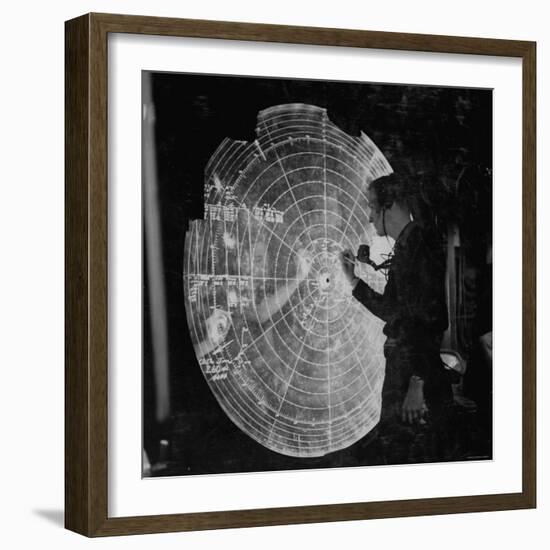 US Navy Technician Marking Radar Data on Chart, Tracking Enemy Japanese Ships in WWII Pacific-null-Framed Photographic Print