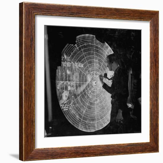 US Navy Technician Marking Radar Data on Chart, Tracking Enemy Japanese Ships in WWII Pacific-null-Framed Photographic Print