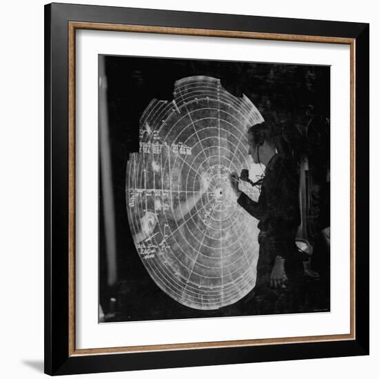 US Navy Technician Marking Radar Data on Chart, Tracking Enemy Japanese Ships in WWII Pacific-null-Framed Photographic Print