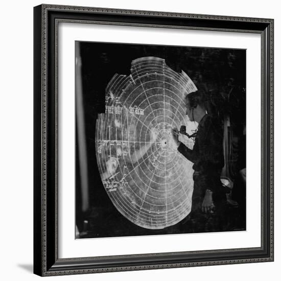 US Navy Technician Marking Radar Data on Chart, Tracking Enemy Japanese Ships in WWII Pacific-null-Framed Photographic Print