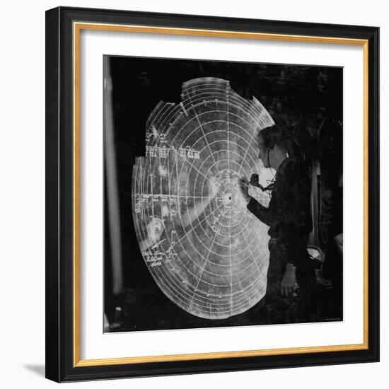 US Navy Technician Marking Radar Data on Chart, Tracking Enemy Japanese Ships in WWII Pacific-null-Framed Photographic Print