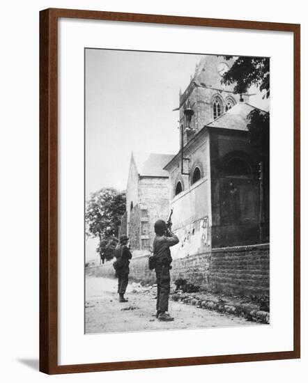 Us Paratrooper Fires into Church Steeple at Sainte Mere Eglise to Clear Enemy Sniper, 6th June 1944-null-Framed Photographic Print