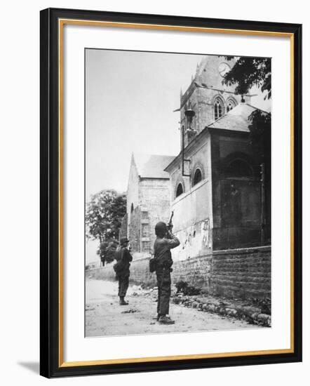 Us Paratrooper Fires into Church Steeple at Sainte Mere Eglise to Clear Enemy Sniper, 6th June 1944-null-Framed Photographic Print