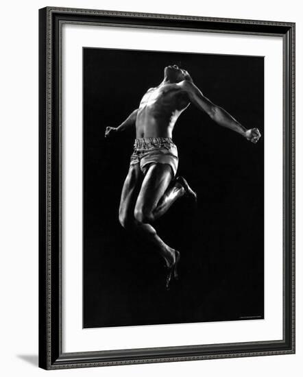 US Pentathlon Champion John Borican at the Peak of His Broad Jump-Gjon Mili-Framed Premium Photographic Print