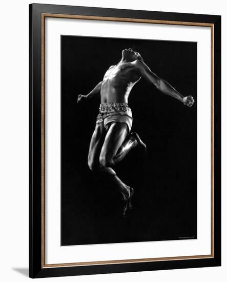 US Pentathlon Champion John Borican at the Peak of His Broad Jump-Gjon Mili-Framed Premium Photographic Print