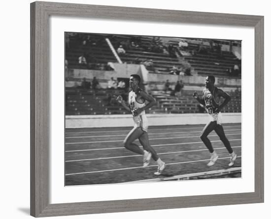 US Rafer Johnson and Nat. China Yang Chuan Kwang During Running Event at Olympics-null-Framed Premium Photographic Print