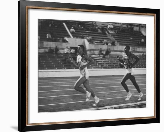 US Rafer Johnson and Nat. China Yang Chuan Kwang During Running Event at Olympics-null-Framed Premium Photographic Print